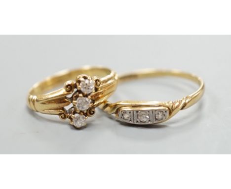 Two early 20th century 18ct and three stone diamond rings, sizes I and R/S gross weight 5.1 grams.