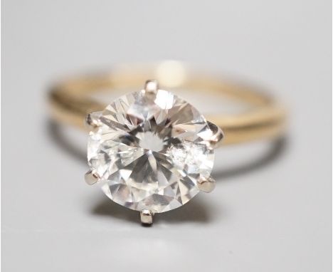 A 14k yellow metal and solitaire diamond ring, the stone weighing 2.04ct, size J/K, gross weight 3.1 grams, with an estimated