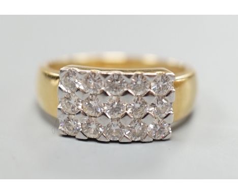 A modern 18ct gold and pave set diamond cluster ring, size K, gross weight 3.9 grams.