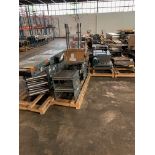 Large Lot of Roller Conveyor Sections including Straights and Curves, Stands a. Rigging Fee: $1,200