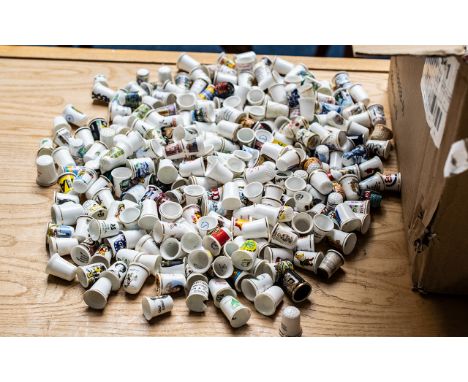 A Large Collection of Ceramic Thimbles, collected over the years by a private collector. Plenty to sort. All various colours,