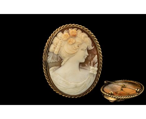 Mid 20th Century - Attractive and Large Shell Cameo Brooch, Set In 9ct Gold Oval Mount. Full Hallmark for 9.375. Depicts a Po