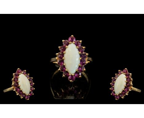 Ladies 9ct Gold Attractive Opal and Ruby Set Dress Ring. Full Hallmark to Interior of Shank. The Opal of Pale Colour, Est 2.0