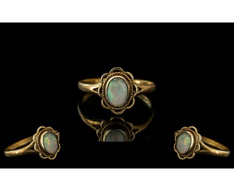 18ct Gold - Attractive Single Stone Opal Set Ring. Marked 18ct to Interior of Shank. The Cabouchon Cut Oval Shaped Opal of Go