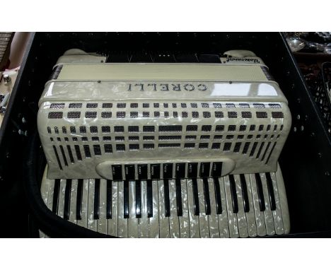 Cintage Corelli Universal Piano Accordion, cream colour, in fitted case.  Measures 21" x 21".  Lovely item.