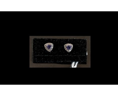 Tanzanite Trillion Cut Halo Stud Earrings, solitaire, trillion cut tanzanites, of good colour, set within frames of sparkling