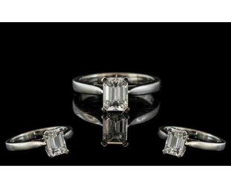 Ladies 18ct White Gold Single Stone Diamond Set Ring marked 750 to interior of shank. The step cut diamond of excellent colou