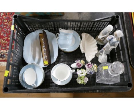 Box of blue and white part tea set, figurines, flower posy ornaments, decanter and Carrick of Scotland bracelet