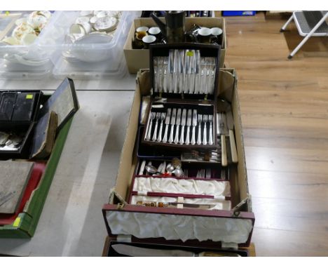 Quantity of cased cutlery including horn topped carving knife set and a Royal Crown Derby bread knife. This bladed product is