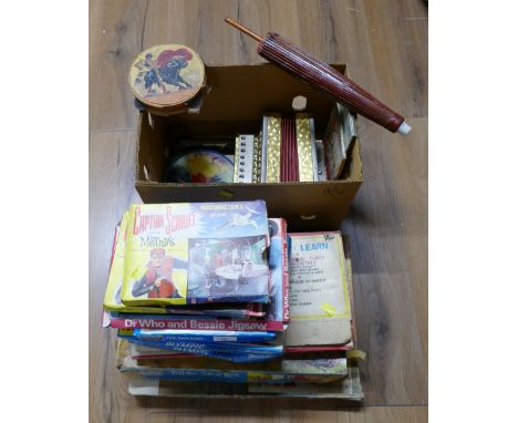 Box of vintage children's toys including a tambourine, organ, box of puzzles including Captain Scarlet and Olympic Sports