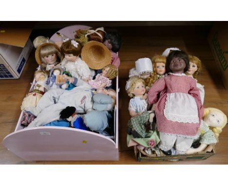 Wooden dolls cot and collection of vinyl headed and softy dolls