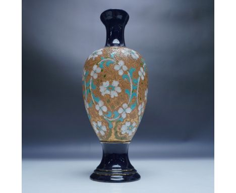 This Royal Doulton Slater’s Patent vase showcases the brand's exquisite craftsmanship with its elegant tapestry-style design.