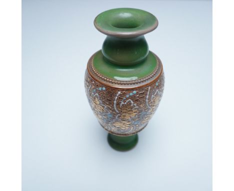 This Royal Doulton Stoneware Slaters Patent slender bud vase exemplifies the brand’s craftsmanship, featuring a textured gilt