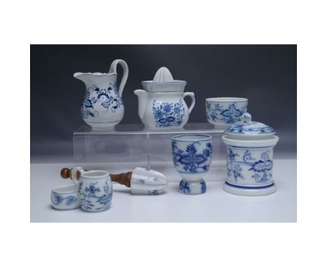 A charming assortment of blue and white porcelain tableware, featuring various functional pieces adorned with intricate flora