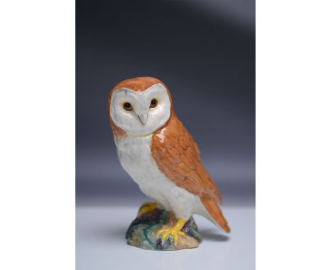 A beautifully crafted John Beswick ceramic figurine of a Barn Owl (B 1046), capturing the elegance and natural charm of this 
