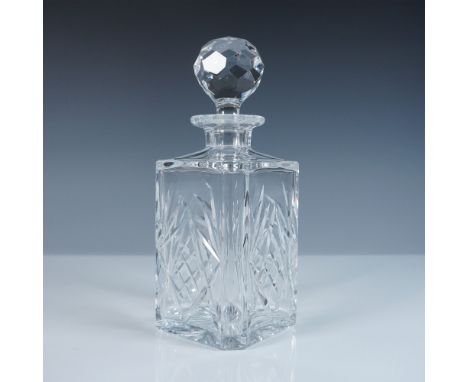 Elegant crystal decanter by Thomas Webb of England, featuring a finely cut geometric pattern that enhances its reflective bri