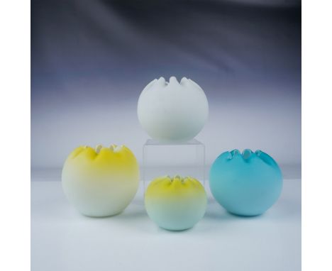 A charming assortment of four Victorian satin glass rose bowls, each showcasing delicate craftsmanship and elegant design. Th