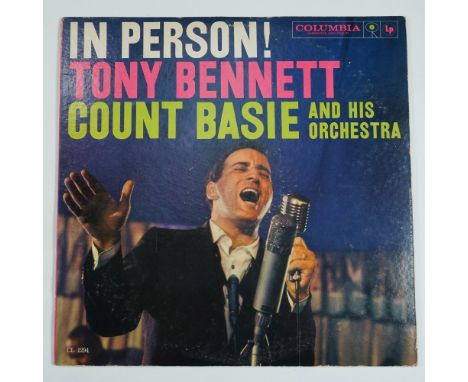 This classic jazz album, In Person, features Tony Bennett backed by Count Basie and His Orchestra, capturing the energy of a 