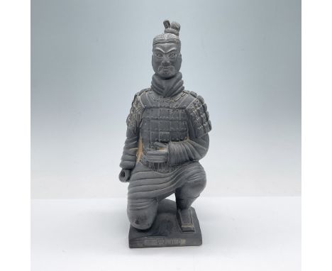 A ceramic figurine depicting a kneeling Chinese soldier, inspired by the iconic Terracotta Army. The figure is intricately de