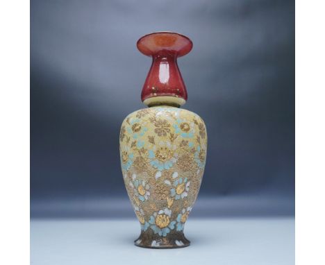 This exquisite Royal Doulton Slater’s Patent vase showcases a stunning tapestry-style design, a hallmark of the Slater’s pate