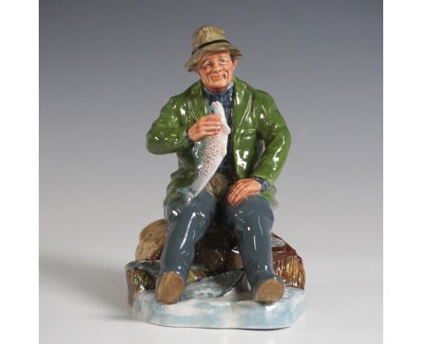 Charming Royal Doulton figurine titled A Good Catch, model HN2258. Designed by Mary Nicoll and issued in 1966, this figurine 