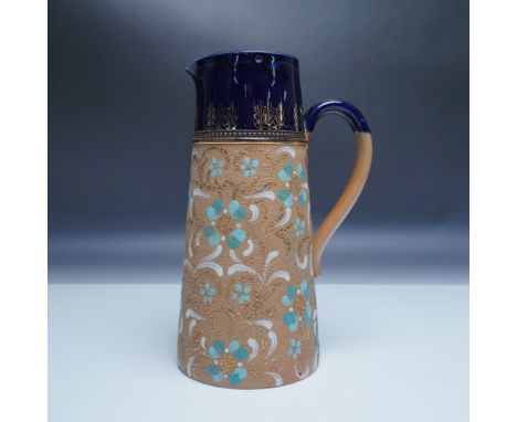 This Royal Doulton Slaters Patent water jug exemplifies the brand’s innovative ceramic techniques, featuring a pewter-mounted