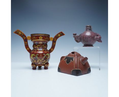 An intriguing set of three Chinese-style vessels, each showcasing distinctive craftsmanship and cultural influences. Hand-Pai