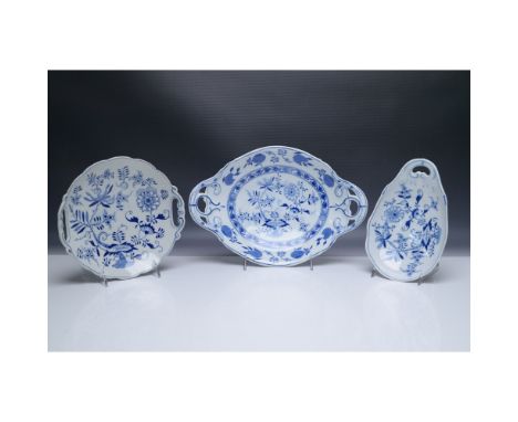 This 3-piece porcelain serving set features the timeless Zwiebelmuster (Blue Onion) pattern, a classic European design inspir