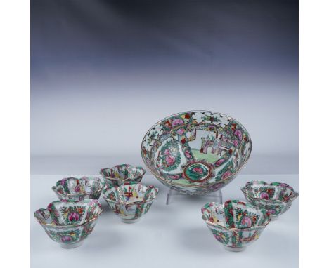 A 7-piece Chinese Rose Medallion porcelain bowl set, featuring a large bowl and six smaller scalloped bowls. Each piece is me