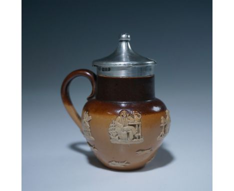 This Royal Doulton covered saltglazed condiment pot showcases the brand's signature stoneware craftsmanship. Featuring a rich