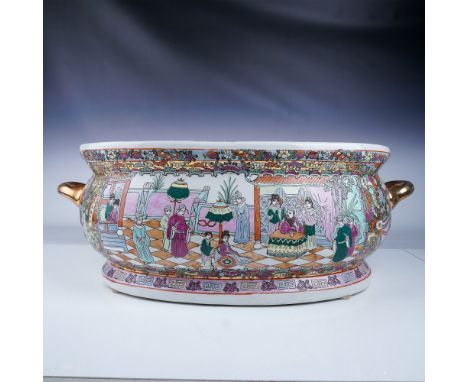 A large and ornate Chinese basin in the Rose Medallion style, featuring vibrant hand-painted scenes of courtly life, floral m