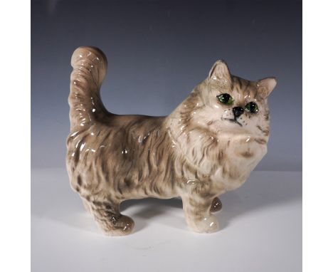 This is a Royal Doulton porcelain figurine depicting a Persian cat. Crafted with fine detail and hand-painted to showcase the