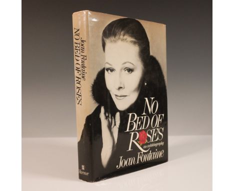 This first edition of No Bed of Roses, the autobiography of Joan Fontaine, is signed by the author in bold pink ink on the ti