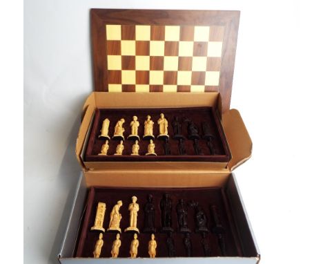 Hand crafted chess set in the form of Sherlock Holmes characters with chessboard in original boxes, the chess set is hand cra