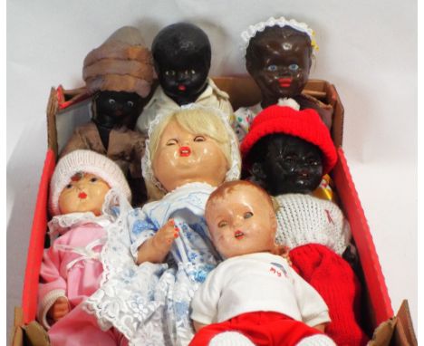 Seven mostly mid century vintage dolls