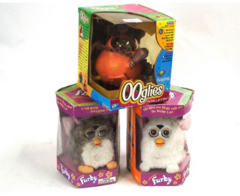 Two Vintage Electronic Furby's in Original boxes and an Electronic Ooglies in Original box