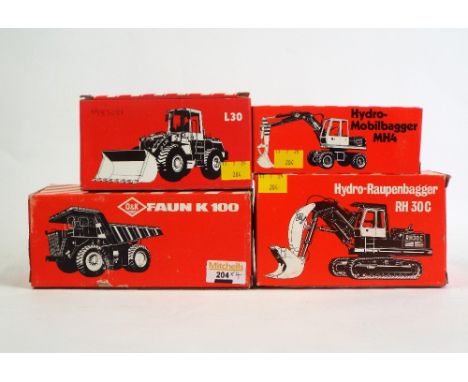 Four boxed O &amp; K Diecast construction vehicles, Faun K100, RH30C, MH4 and an L30