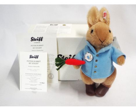 Steiff Peter Rabbit soft toy with original Steiff button to the ear, certificate and box