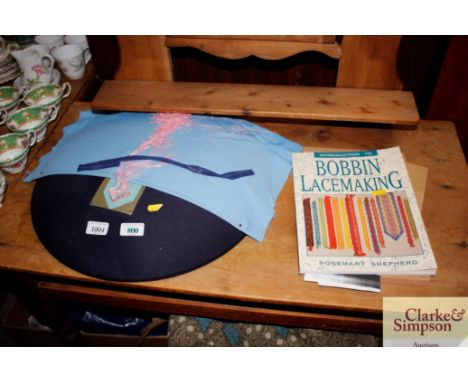 A bobbin lace making book and a bobbin lace making pad