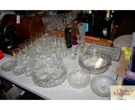 A quantity of table glassware to include amethyst coloured vase 