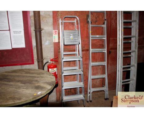 An aluminium loft ladder and an aluminium step ladder