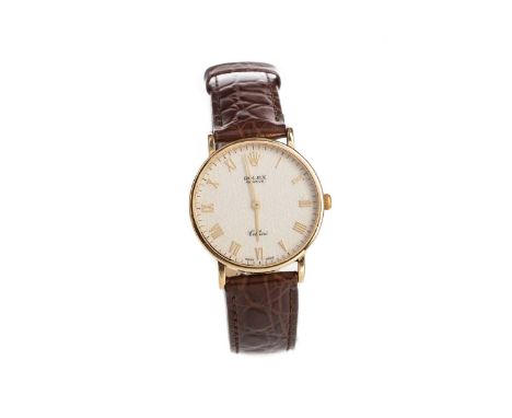 GENTLEMAN'S ROLEX CELLINI EIGHTEEN CARAT GOLD MANUAL WIND WRIST WATCH,the round textured dial with 'ROLEX' print, Roman hour 
