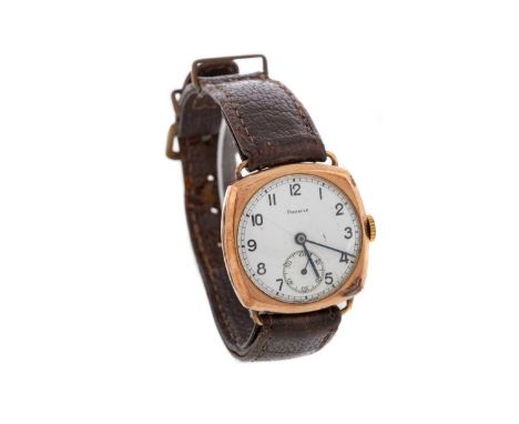 GENTLEMAN'S PINNACLE NINE CARAT GOLD MANUAL WIND WRIST WATCH,the round white enamel dial with Arabic hour markers, railroad o