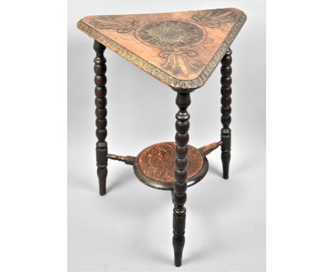 A Late 19th Century Triangular Oak Occasional Table with Tripod Bobbin Supports, Circular Stretcher Shelf, Carved Top, 57cm w