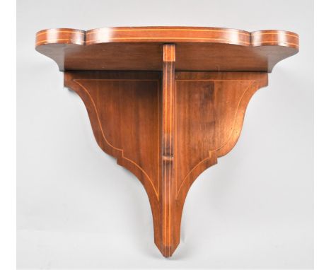 An Edwardian String Inlaid Mahogany Wall Hanging Shelf Sconce, 31cm wide 