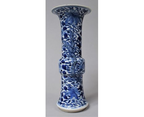 A 19th Century Chinese Blue and White Gu Shaped Beaker Vase of Flared Neck Form Decorated with Dragons Amongst Foliage, Four 