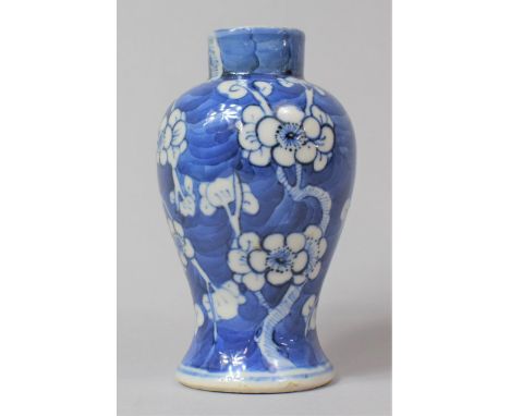 A 19th Century Blue and White Prunus Pattern Vase, Four Character Mark to Base for Kangxi, 13cm high 