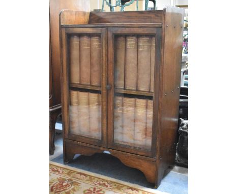 An Edwardian Oak Galleried and Glazed Bookcase Containing 1910 Edition Encyclopedia Britannica, 59cm wide 