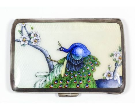 A Continental silvery metal and enamel rectangular cigarette case, the lid enamelled with a peacock perched on a flowering br