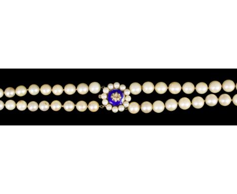 A 1950's twin strand graduated cultured pearl necklace with 9ct gold, blue enamel and pearl set clasp, 600mm overall (gross w